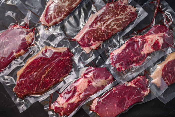set vacuum packed organic raw beef alternative cuts top blade rump picanha chuck roll steaks black textured background top view